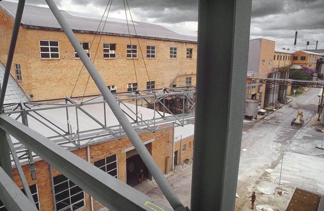 Working on steel frame construction outside building