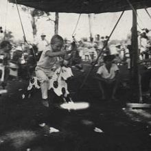 Christmas Party - Child on merry-go-round
