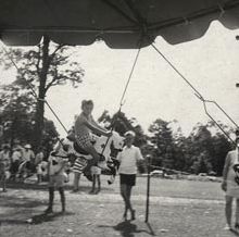 Christmas Party - Child on merry-go-round