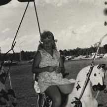 Christmas Party - Child on merry-go-round