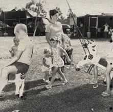 Christmas Party - Children on merry-go-round