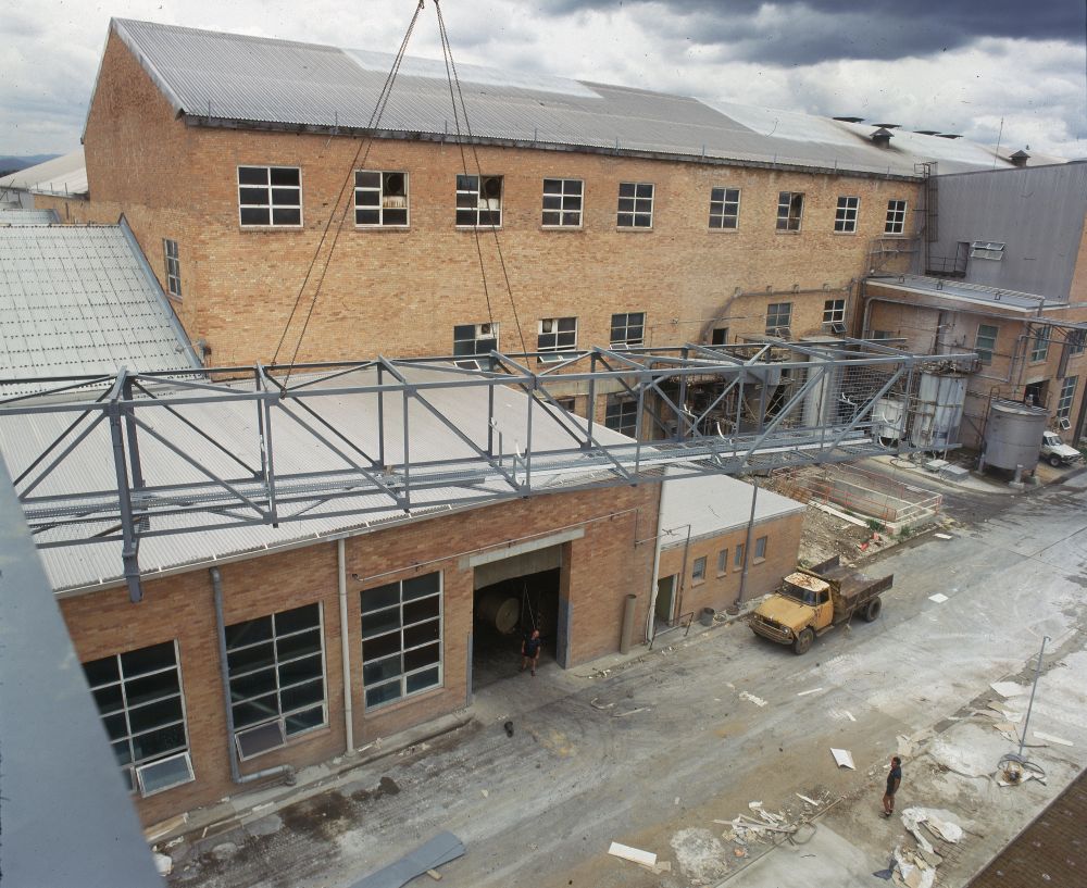 Working on steel frame construction outside building