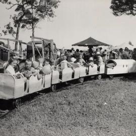 Children enjoying model train ride