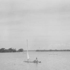 Murray Garland sailing in Pumicestone Passage near Donnybrook, ca. 1963