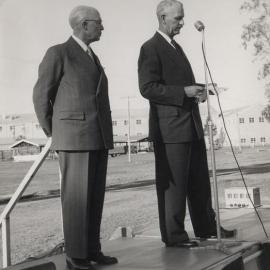 C.S. Burton & A.S. Gehrmann making a speech