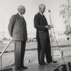 C.S. Burton & A.S. Gehrmann making a speech