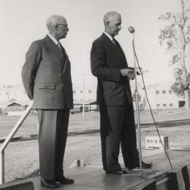 C.S. Burton & A.S. Gehrmann making a speech