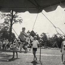 Christmas Party - Child on merry-go-round