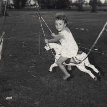 Christmas Party - Child on merry-go-round