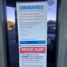 QML Pathology Warner Marketplace Samsonvale Road Warner - 10 April 2020 - cannot test for Coronavirus signage