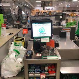 Woolworths Supermarket - Warner Marketplace Samsonvale Road Warner - 10 April 2020 - clear perspex barrier for cashiers and signage