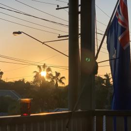 Griffith Road Scarborough - 25 April 2020 - Australian flag on balcony at dawn - 002