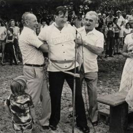 Cr Alex Barr being taken hostage by fellow Councillors during The Independence celebrations