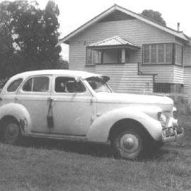Willy's sedan parked in front of holiday house in Fourth Avenue on Bribie Island