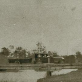 Crossing the old North Pine River bridge, ca. 1930