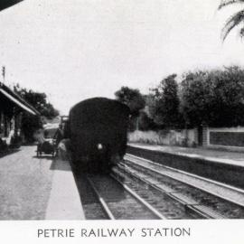 Postcard showing the Petrie Railway Station in the 1930s