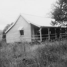 Front and side view of Hay Cottage when it was a farmhouse at Rush Creek, near Dayboro in 1976