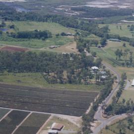 Aerial view over pineapple farm on Brays Road Griffin, 1996