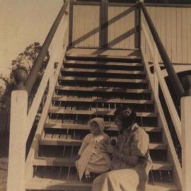 On the steps with baby