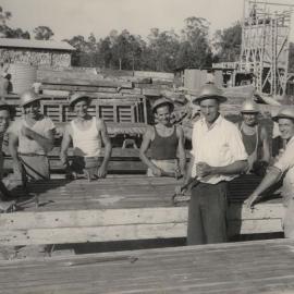 8 workers working on mill construction (Outdoor)