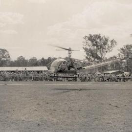 Christmas Party 1958 - Santa arriving in TAA Helicopter