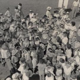 Christmas Party 1958 - Crowding around Santa