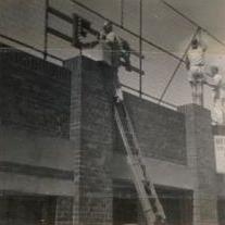 F.J. Ryan, Norm Tubman & Alex Tunin working on Signage