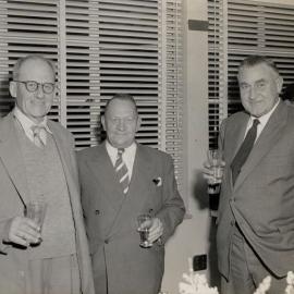3 Men enjoying a drink
